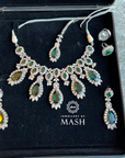 Scarlet Bridal Set which includes a necklace, earrings, and a tikka.